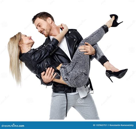 a man is holding a woman in his arms stock image image of male happiness 132963751