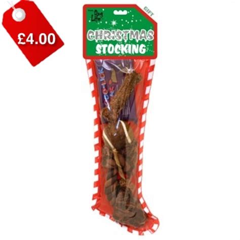 Christmas stocking stuffed filled with candy and treats. Top Stocking Fillers For Dogs For Under £5 - Chelsea Dogs Blog