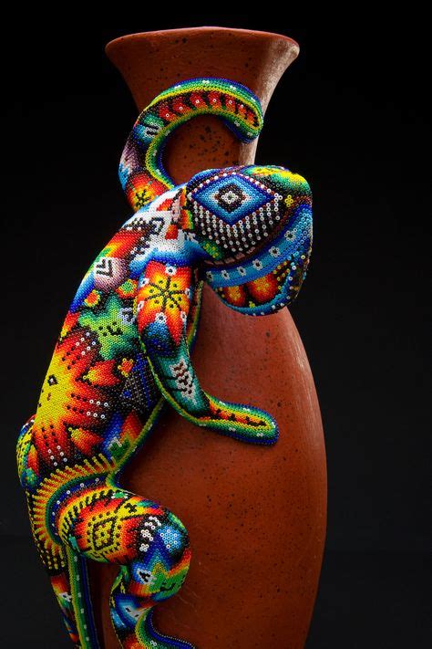 The Huichol Indians Decorate Vases Using Tree Sap And A Large Number Of Small Brightly Colored