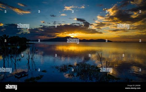 Beautiful Scenic Of Sun Set Sky At Bangpra Reservoir Lake In Chonburi