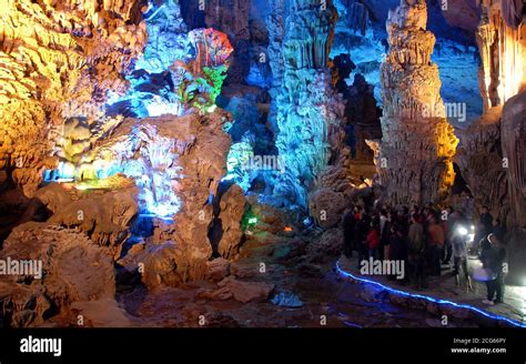 Reed Flute Cave Guilin In Guangxi Province China A Group Of Tourists
