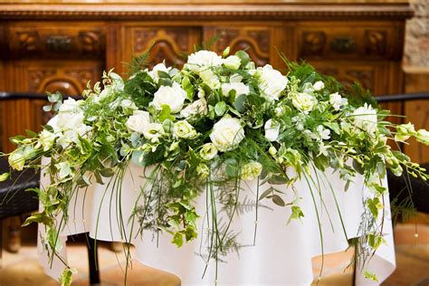 Long And Low Top Table Arrangement Shape Can Also Be Used On Alter In
