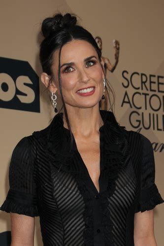 The Real Story Behind Demi Moore’s Missing Front Teeth - Michael J. Wei
