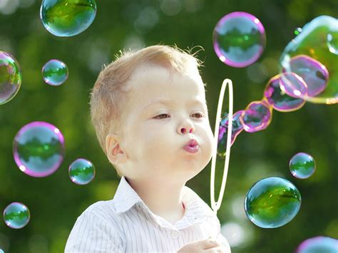 Watch as they struggle to blow them, and their awe when they succeed! 10 fun activities to do with bubbles!