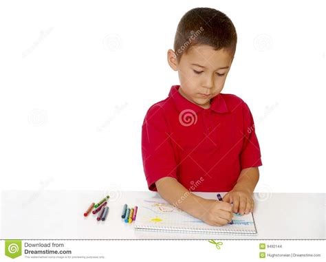 Download Boy coloring with crayons stock photo. Image of seven ...