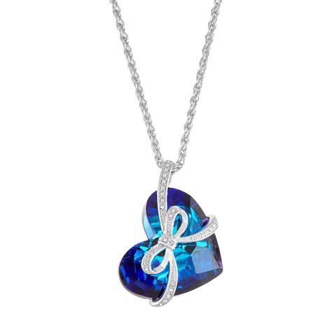 Featuring A Beautiful Blue Crystal Heart Wrapped In A Crystal Covered
