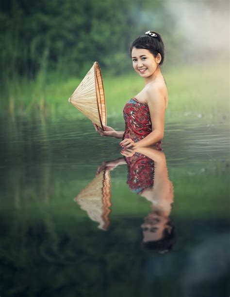 Asian Sexy Women Bathing At River By Sasin Tipchai Photo