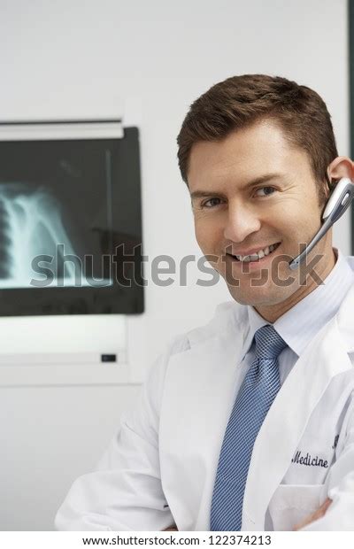 Portrait Happy Male Doctor Smiling Clinic Stock Photo 122374213