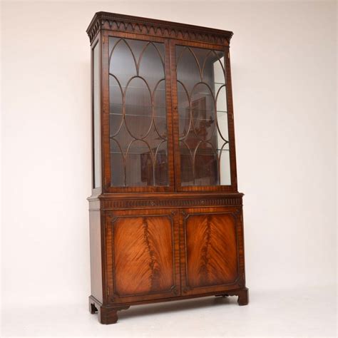 A lovely mahogany display cabinet with georgian elements. Antique Georgian Style Flame Mahogany Display Cabinet ...
