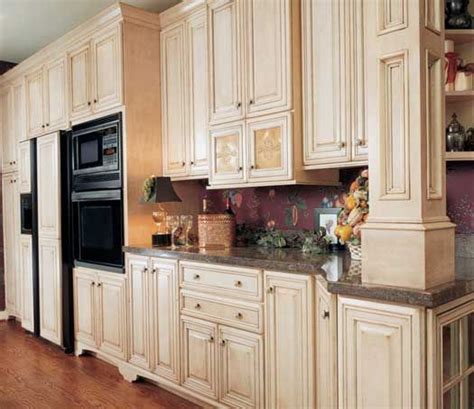 Set the tone in your kitchen with striking light fixtures and under cabinet lighting. Kitchen in Toledo, OH. Designed by Jennifer Diehl with ...