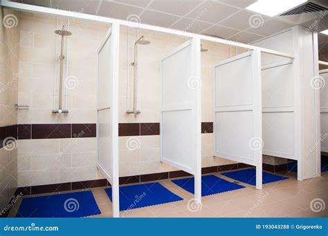 Public Shower Room With Several Showers Big Light Empty Public Shower Room With Bright Walls