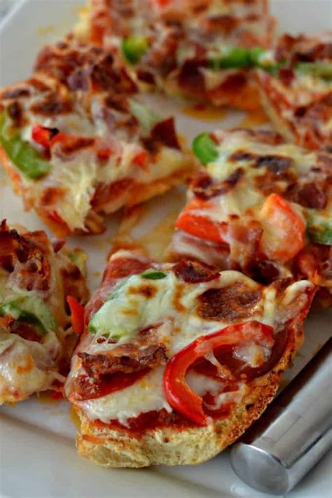 I never seem to have pizza dough on hand, but that doesn't stop our family from enjoying pizza. French Bread Pizza - A Super Easy Quick Family Friendly Meal