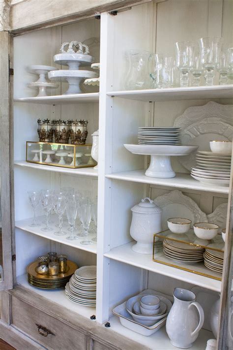 If your china set is extensive, don't try to fit every piece inside the hutch — just arrange items until it is comfortably full and stow the rest in the cupboards below. China cabinet essentials and how to style them | China ...