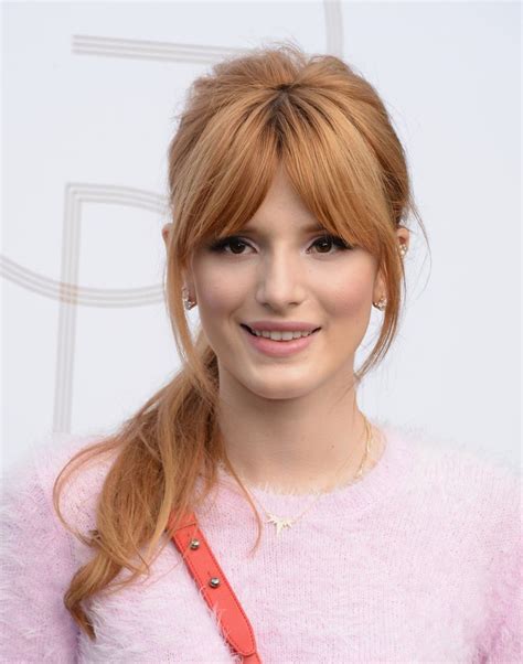 Bella thorne long straight ginger red updo with blunt cut bangs. Bella Thorne Ponytail | Strawberry blonde hair color ...