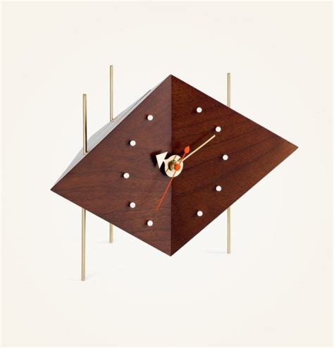 Grey and wood sunburst style wall clock: 41 Mid Century Modern Clocks To Accessorize Your Wall ...