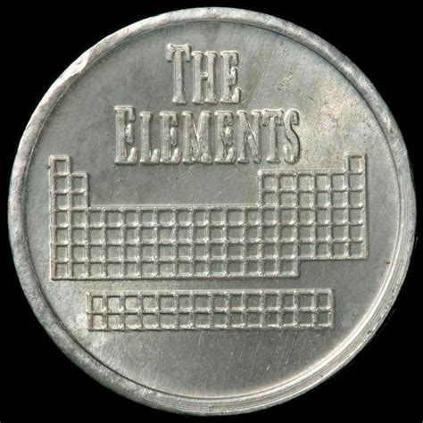 Element coin, a sample of the element Indium in the ...