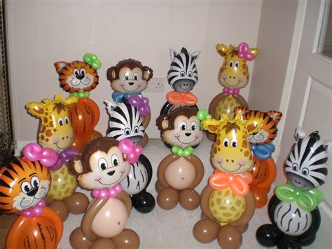 Jungle themed birthday party in chennai. animal centerpieces (can hold helium-filled balloons in ...