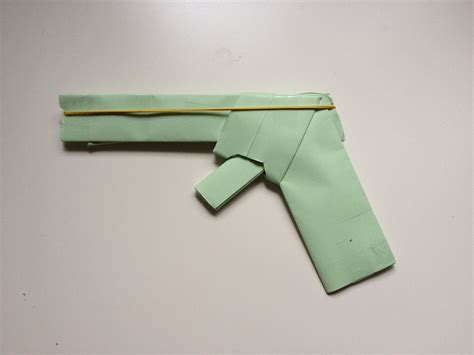 How To Make A Paper Gun That Shoots Rubber Bands (With Trigger). (Easy