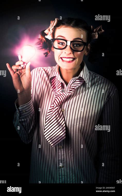 Intelligent Female Business Person Wearing Dorky Glasses Holding