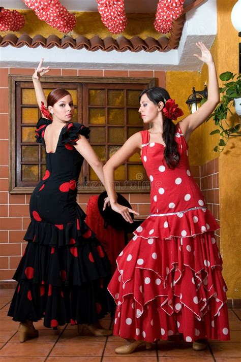 Women In Traditional Flamenco Dresses Dance During The Feria De Abril On April Spain Stock Image