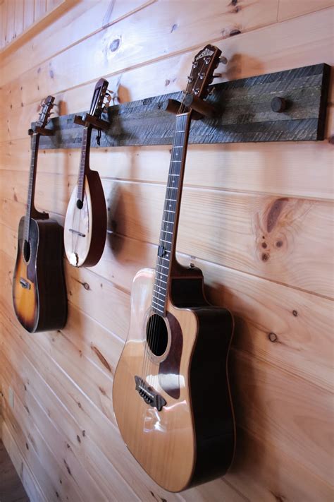 See more ideas about guitar, guitar hanger, guitar wall. -Blue Mountain Woodworks-: Barn Wood Instrument Hanger