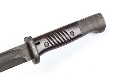 Growth is what we practise and speak every day. K98 bayonet - sgx 44 - Riveted grips, last ditch frog - fjm44