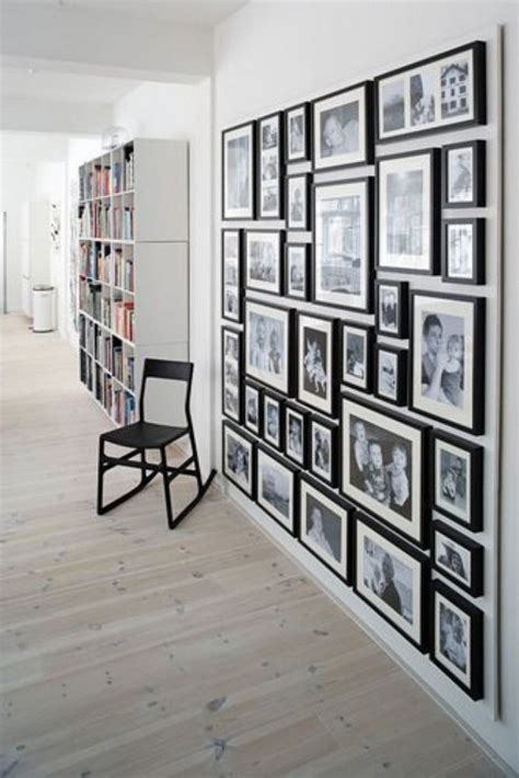 This photo gallery wall is the most modern and unique gallery wall out there! How to Organize Your Photo Wall - 21 Ideas - MessageNote