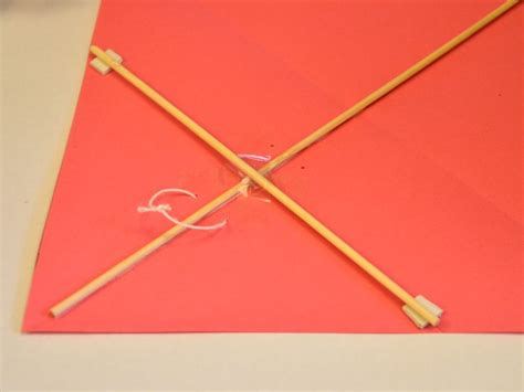 Set the paper on your work surface so that the fold is at the bottom. How to make a simple kite out of paper: A DIY activity for ...