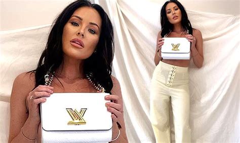 Jess Wright Poses Topless For Sultry Snap With Just A Handbag To Cover