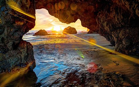 Photo Rays Of Light Beach Sea Sun Crag Nature Sunrise And 1920x1200