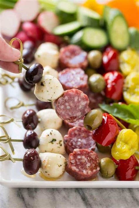 Present your guests with any of these 18 fabulous speared snack recipes and they're sure to raise a toast to your ingenuity — after all, these did you know there's a whole category of appetizers served on sticks out there? Antipasto Skewers - The Best Blog Recipes