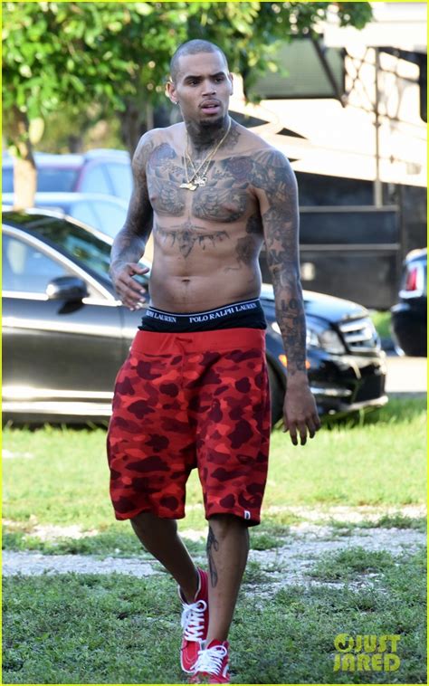 Chris Brown Goes Shirtless For New Music Video Shoot Photo