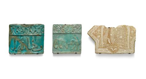 two kashan moulded turquoise glazed pottery border tiles and a lustre star tile fragment persia
