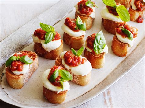 Ingredients in bruschetta with tomato and basil. Tomato, Mozzarella and Basil Bruschetta | Receta | Appetizer & Snacks | Recetas de red de comida ...