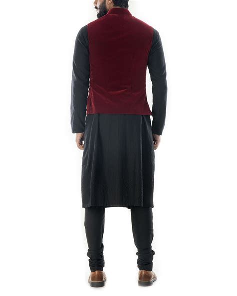 Maybe you would like to learn more about one of these? Black solid kurta with wine red velvet jacket by Anushree ...
