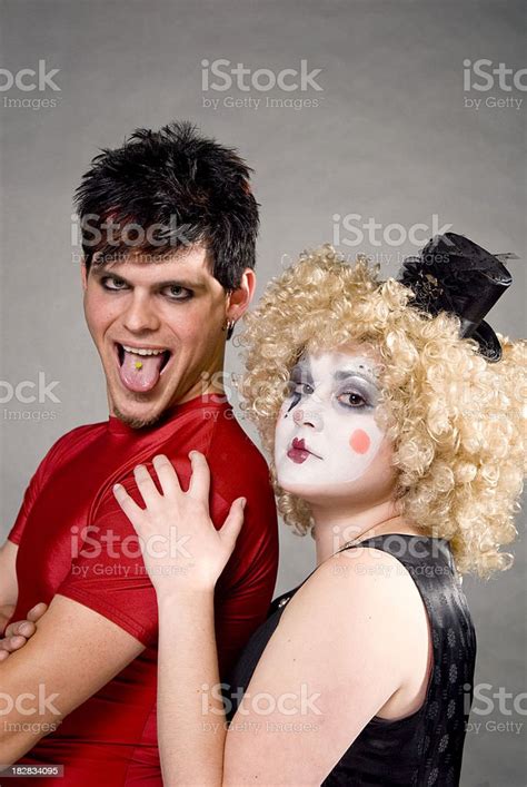 Female Clown Male Circus Performer With Pierced Tongue Sticking Out