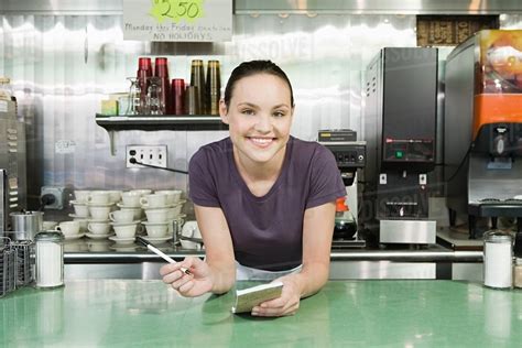 Smiling Waitress In A Diner Stock Photo Dissolve