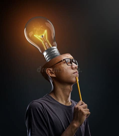 Creative Brain Thinking Glowing Bulb Inside Man`s Head Stock Image
