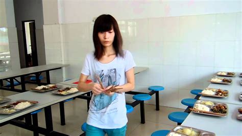a beautiful chinese girl sets chopsticks at the kitchen at jiande yucai youtube