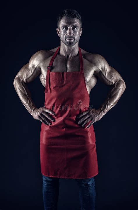 Man Cook Man With Muscular Torso In Chef Apron Cuisine Male Housewife Husband In Kitchen