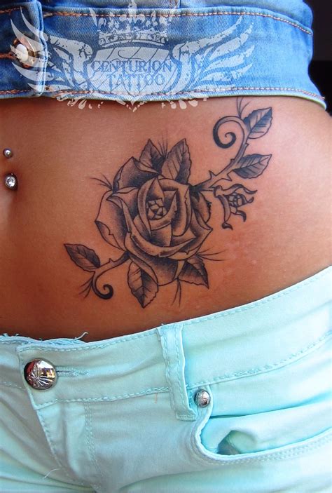 If you opt for the small rose and stem, the sternum good chest tattoos for women will accentuate the curves of your body and complement your style. old school rose tattoo | Stomach tattoos women, Stomach ...