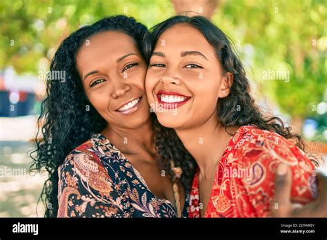 African American Mother And Daughter Smiling Happy Hugging At The Park Stock Photo Alamy