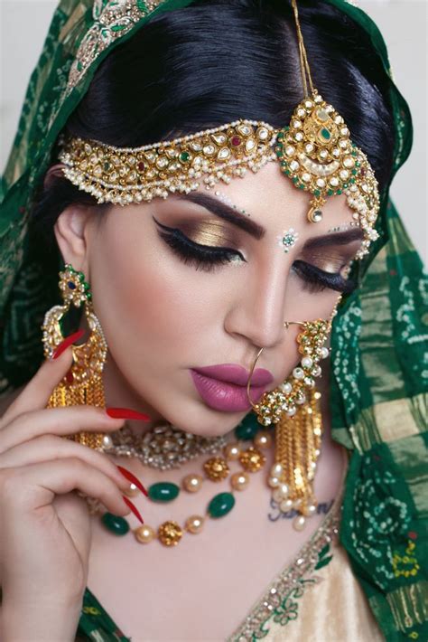 Beautiful Muslim Woman Face Portrait With Bindis And Paint Close Up Of