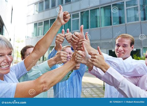Group Of Business People Holding Thumbs Up Stock Image Image Of