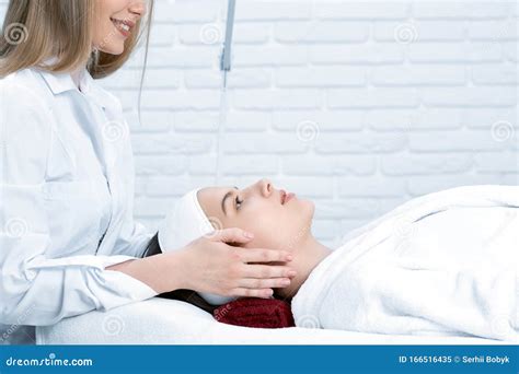 Cosmetologist Working And Doing Face Massage In Salon Stock Image Image Of Natural Doctor