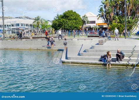 People Walk Along Harbor Edge Tauranga City Waterfront Playground And