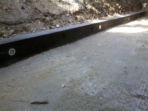 Laying down sleepers for garden edging is a fairly simply diy project. LED lights in railway sleeper retainer | Railway sleepers ...