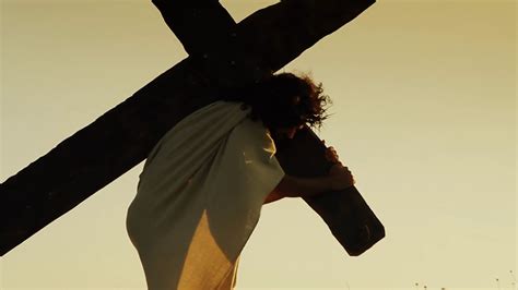 Jesus Carrying The Holy Cross On Calvary Hill Medium Shot Stock Video