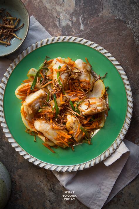 The fish is cooked through when the color in the center is opaque, and not at all translucent. Pan-fried Cod Fish with Crispy Ginger | What To Cook Today