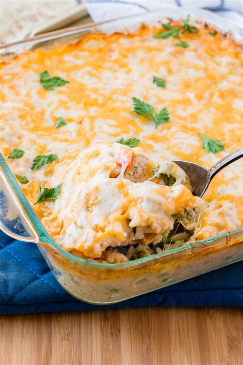 Chicken thigh chicken recipes main dish poultry. Cheesy Chicken and Rice Casserole - Oh Sweet Basil